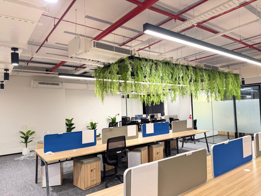 working space with artificial greenery