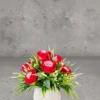 Flower Arrangement Contains Red & Pink Combo roses with grass & leaves